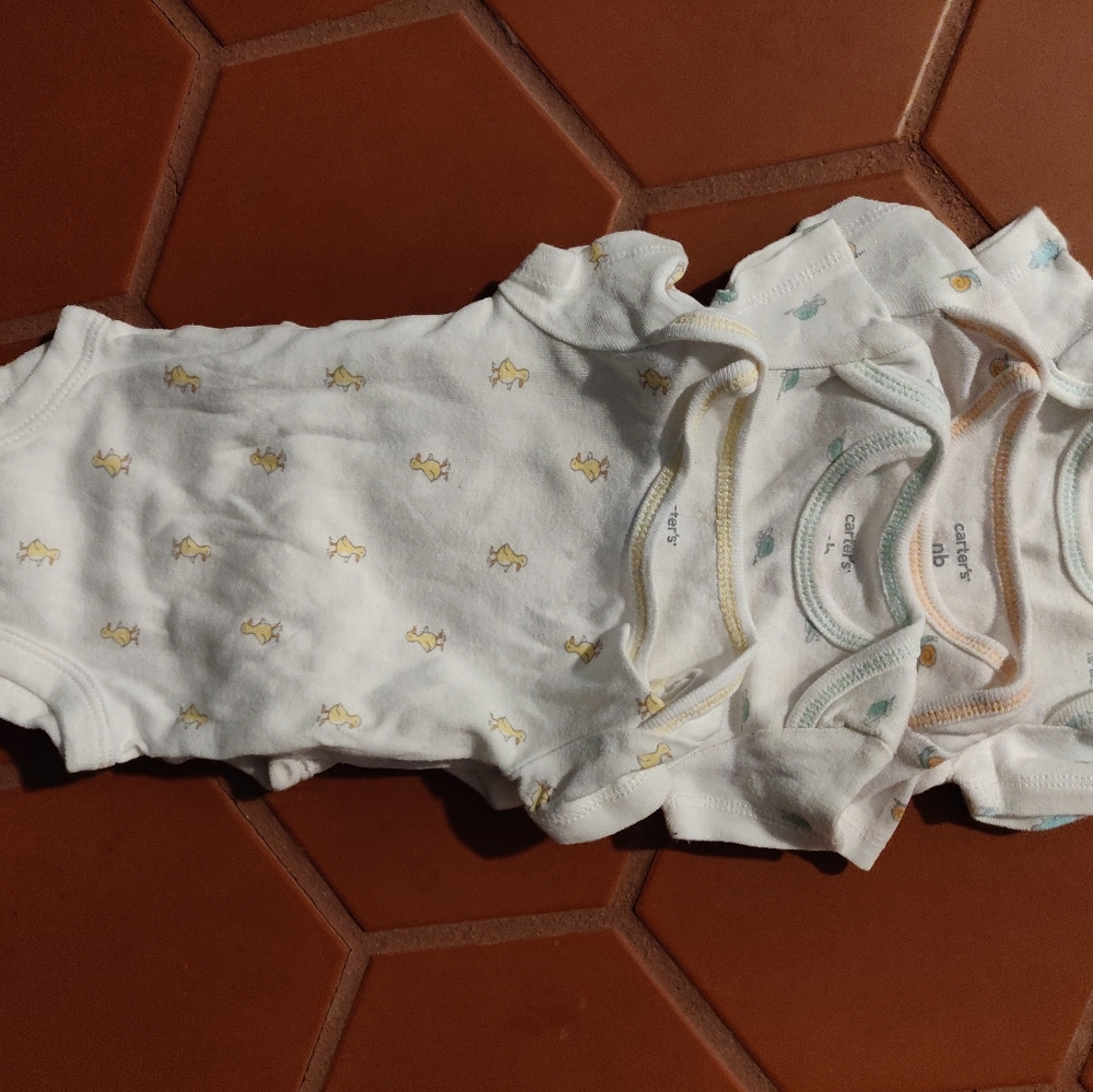 Lot of 4 Carter's NB onesies